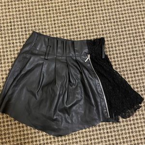 Zara Basic black faux leather circle skirt/shorts. Lace on one side. Size s